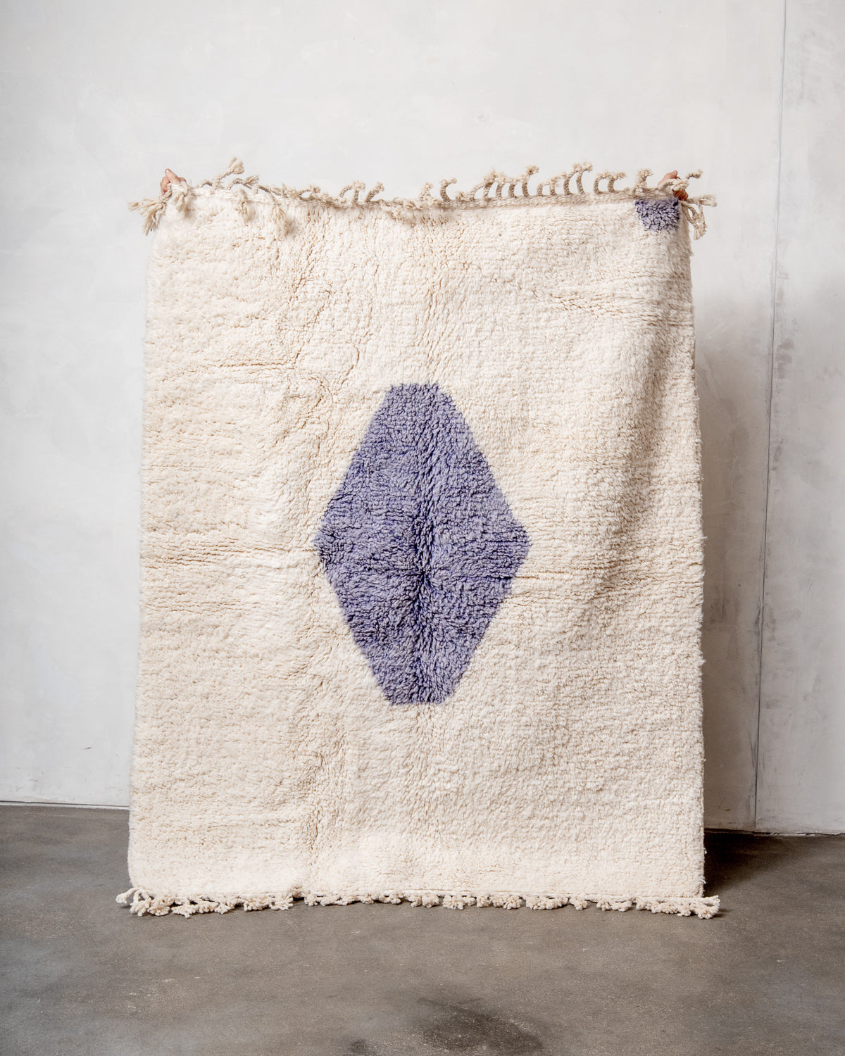 Modern, designer, handcrafted Berber rug from Morocco. Beniourain carpet with beautiful colours and patterns and fluffy wool texture.